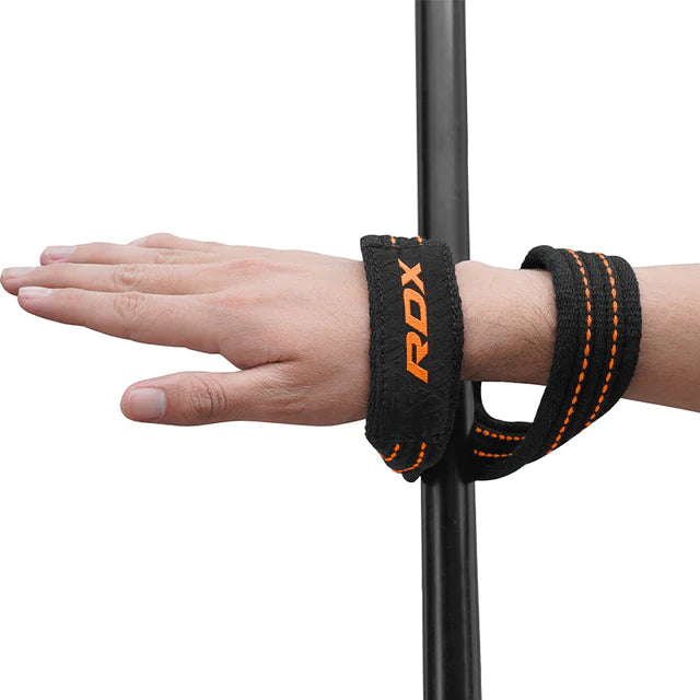 Correas RDX naranjas en Bolivia - entrenamiento con barra pesada - Chelo Sports
