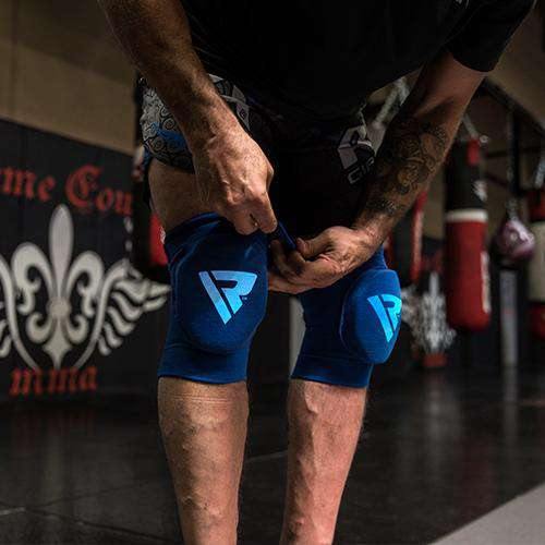Funda acolchada con soporte de rodilla con certificación RDX K1 CE para Muay Thai y MMA - Chelo Sports